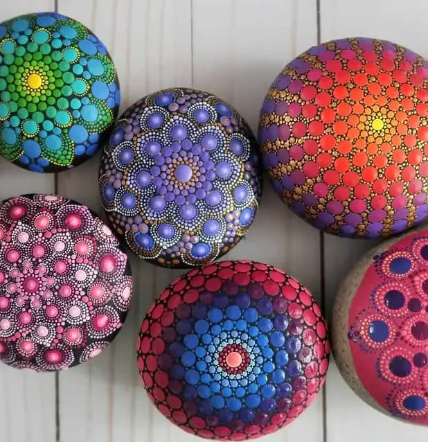 Colorful mandala pattern built from repeating painted shapes