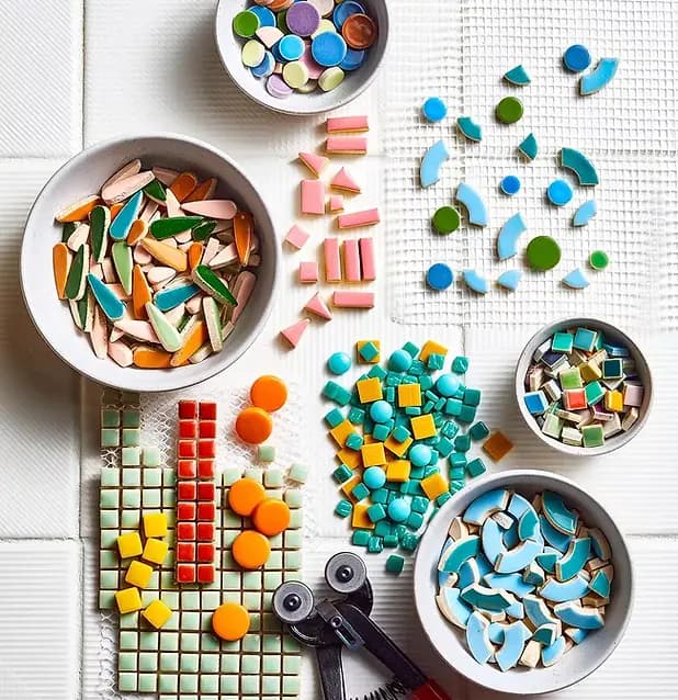 Colorful mosaic tiles arranged into a decorative artwork